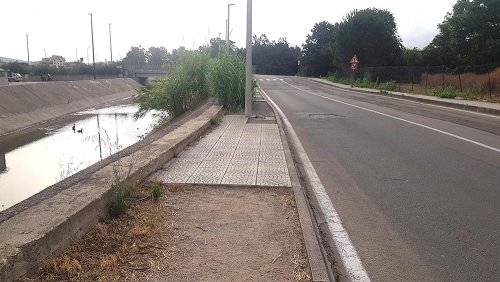 Marciapiedi devastato da alluvione 2013